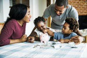 family counting coins